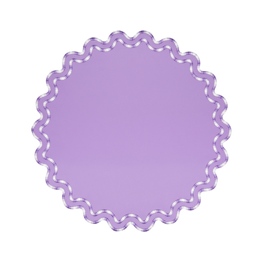 A round, purple faux leather placemat with a decorative edge, displayed on a white background.
