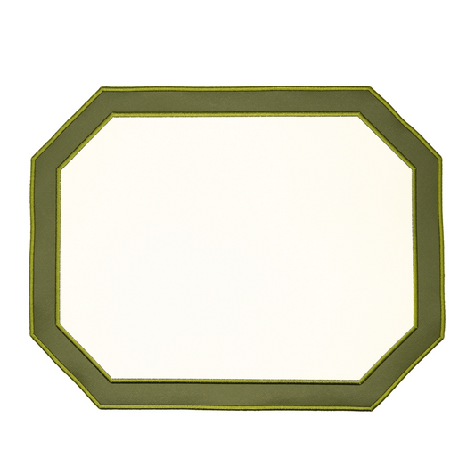 A round dark green faux leather placemat with a decorative edge.