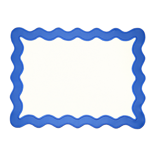 A rectangular blue faux leather placemat with a wavy edge design on a white background.