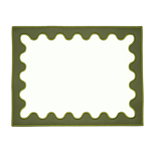 A rectangular dark green faux leather placemat with a stylized border design.