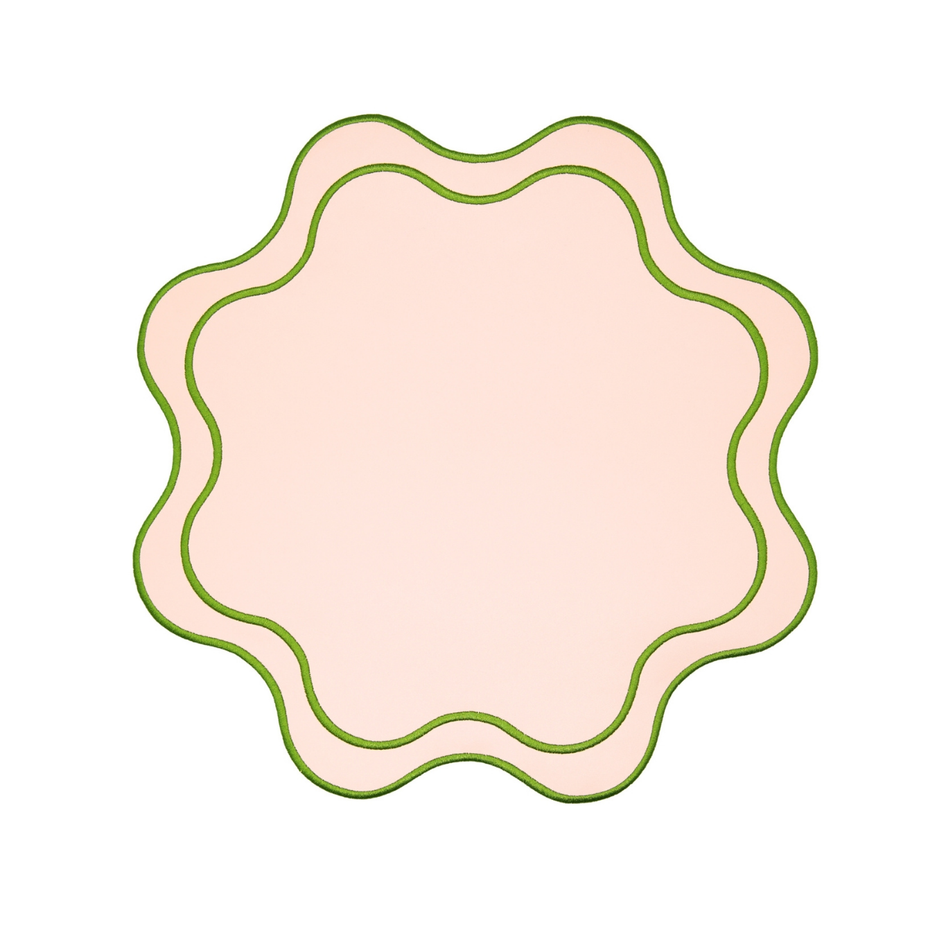 A round pink faux leather placemat with a textured surface and decorative edge.