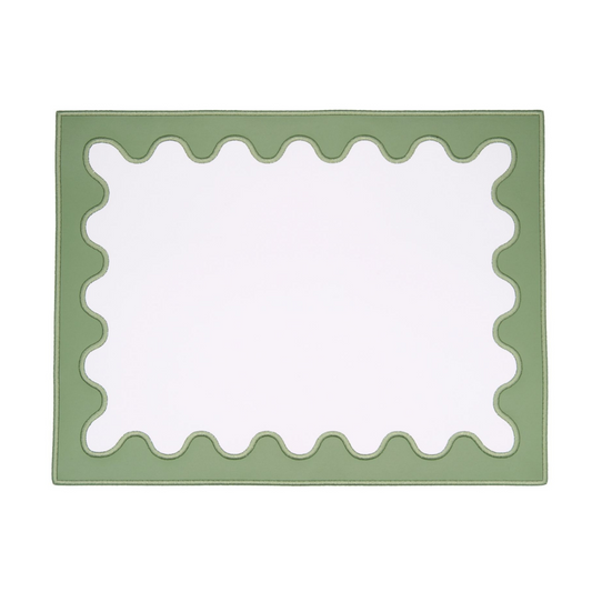 A green faux leather placemat with a wavy edge design on a white background.