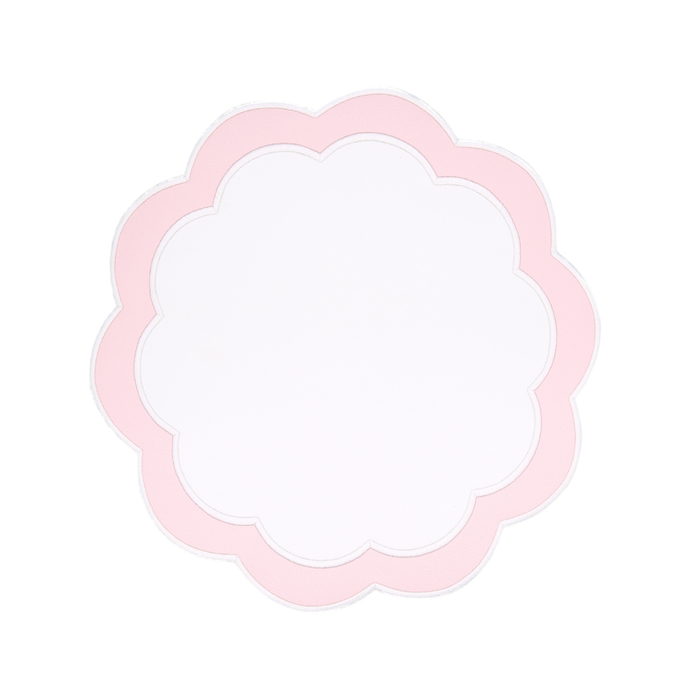 A round pink faux leather placemat with embroidered details on a white background.