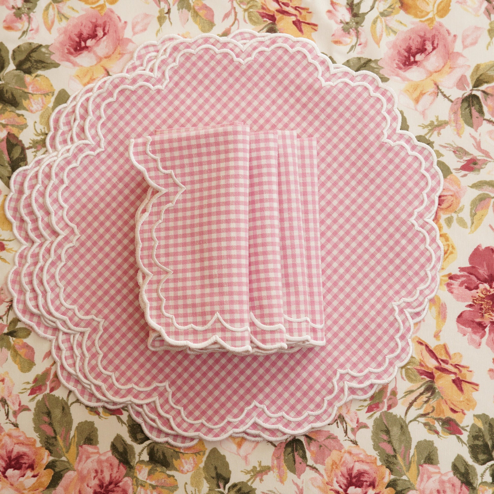 Pink checkered plate on a floral background