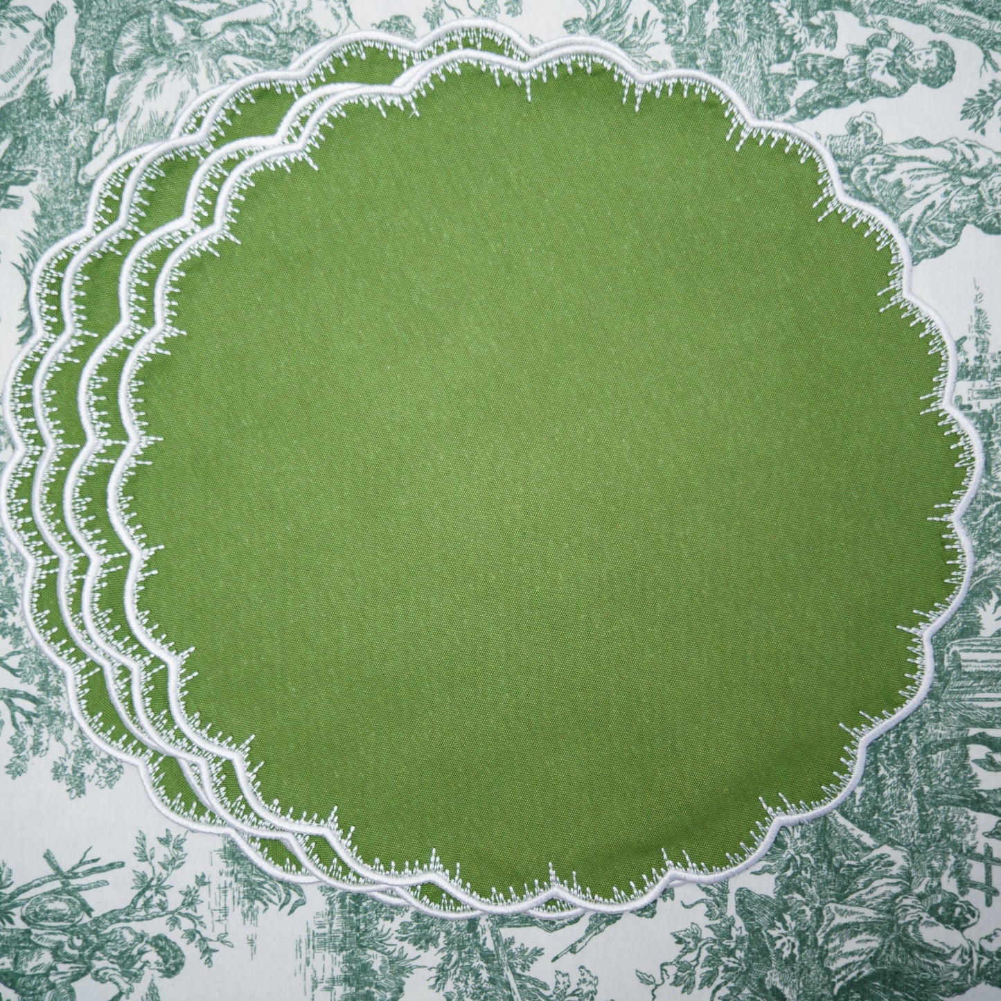 Green circular design on a patterned background