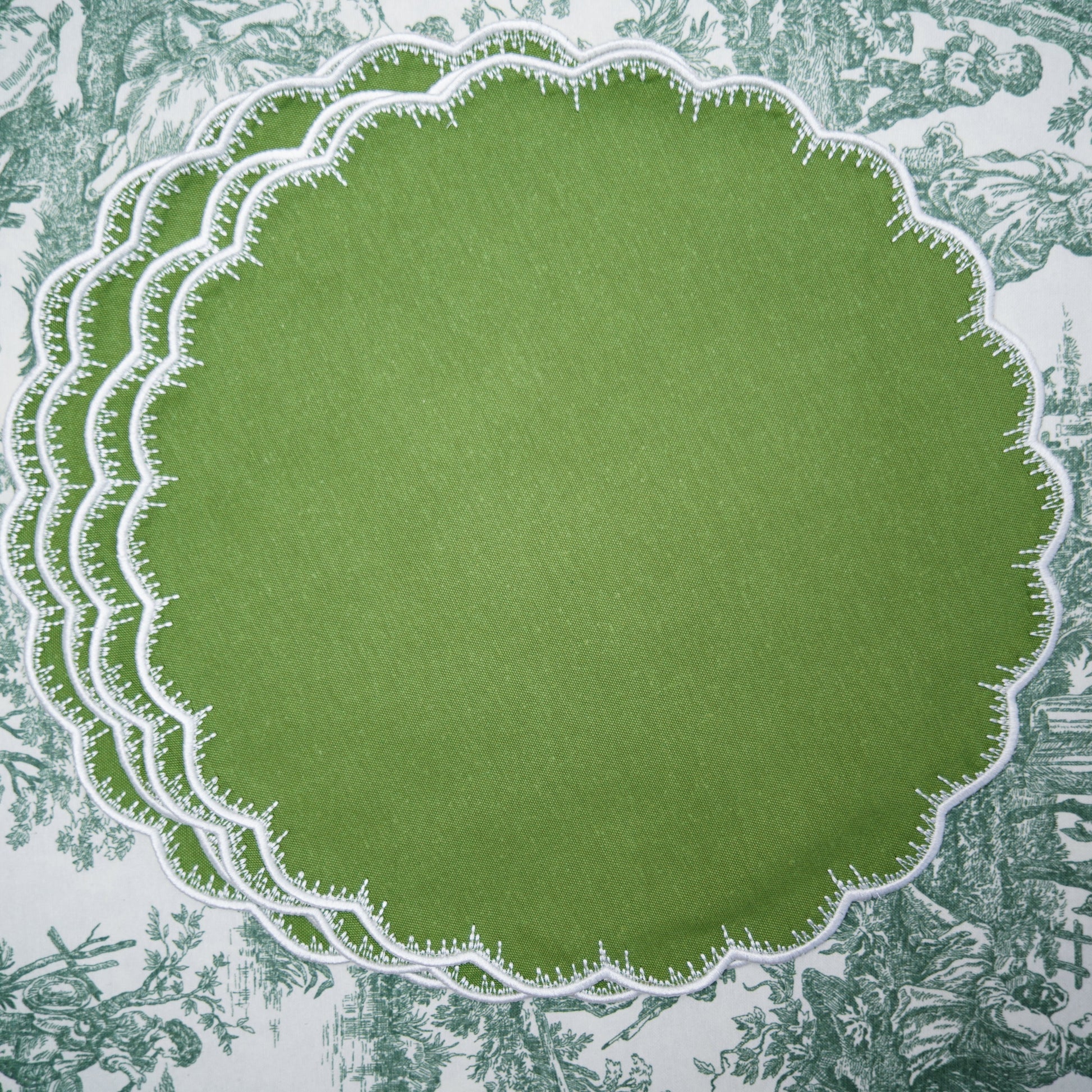 Green circular design on a patterned background