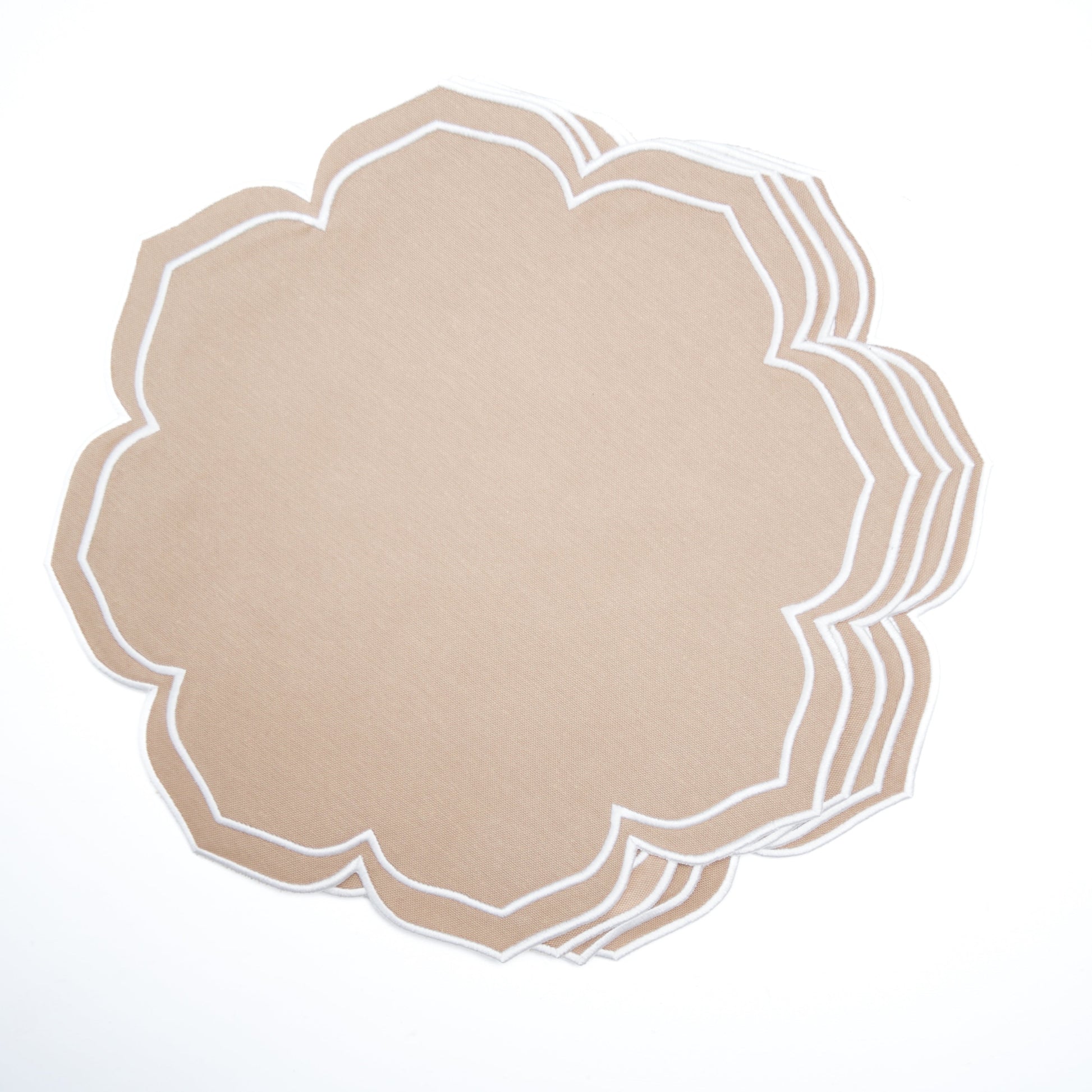 Decorative beige placemat with white scalloped edge on a light gray background