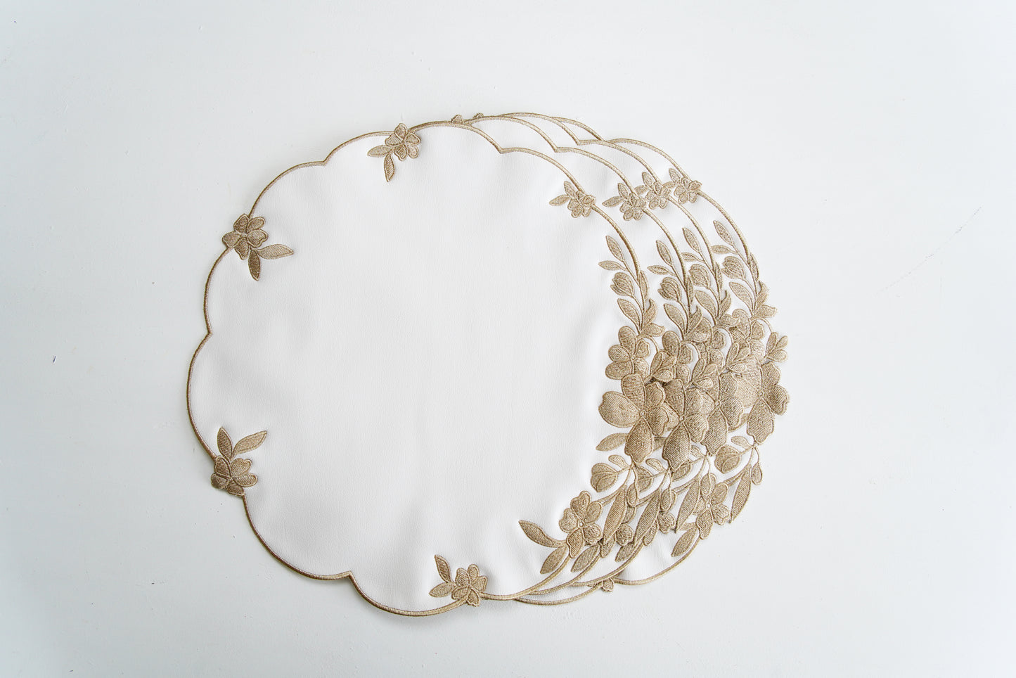 LOTUS WHITE GOLD FAUX LEATHER PLACEMATS