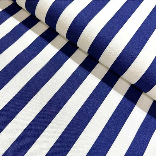 Close-up view of a folded blue and white striped tablecloth.