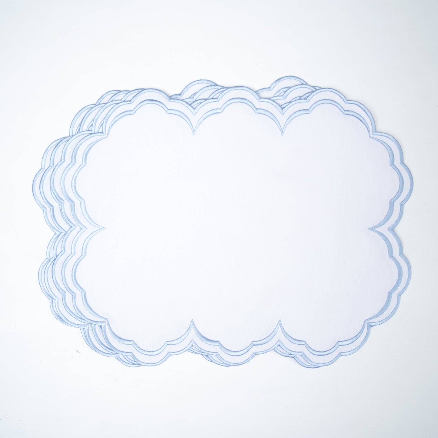 Decorative blue lace overlay on a light gray background
