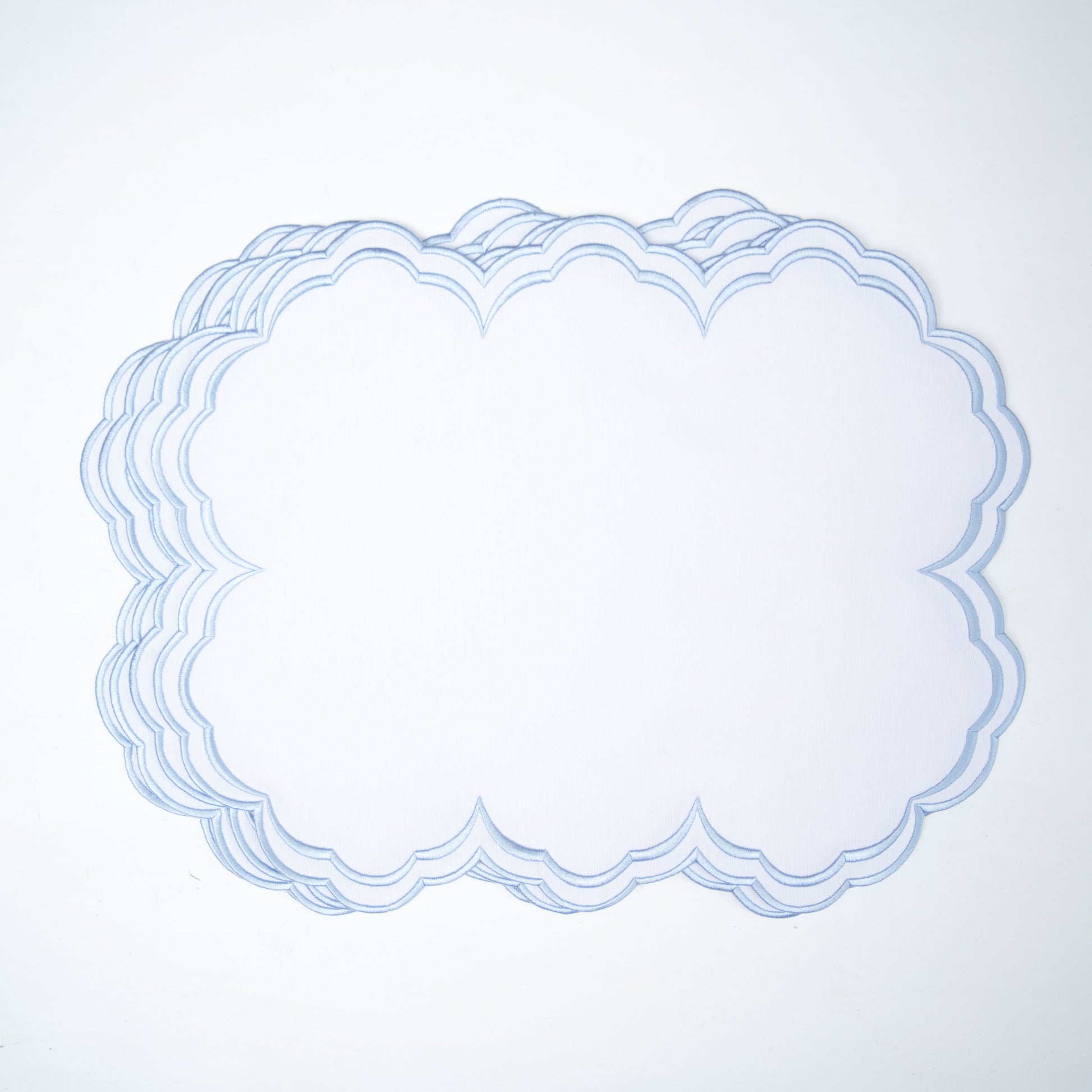 Decorative blue lace overlay on a light gray background