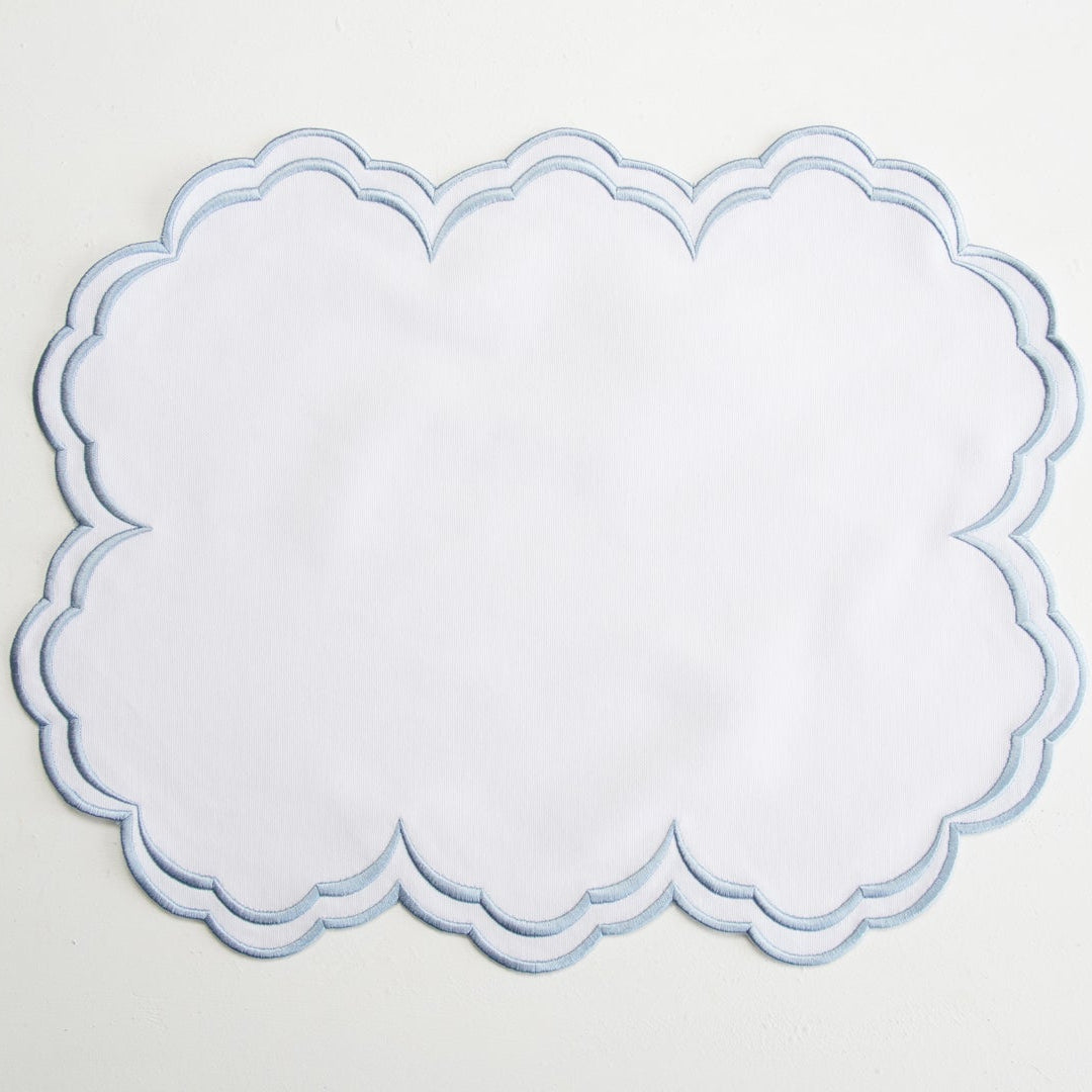 Decorative white doily on a light gray background