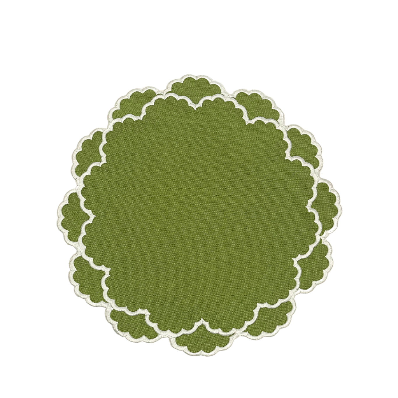 Green circular placemat with scalloped edge on a white background
