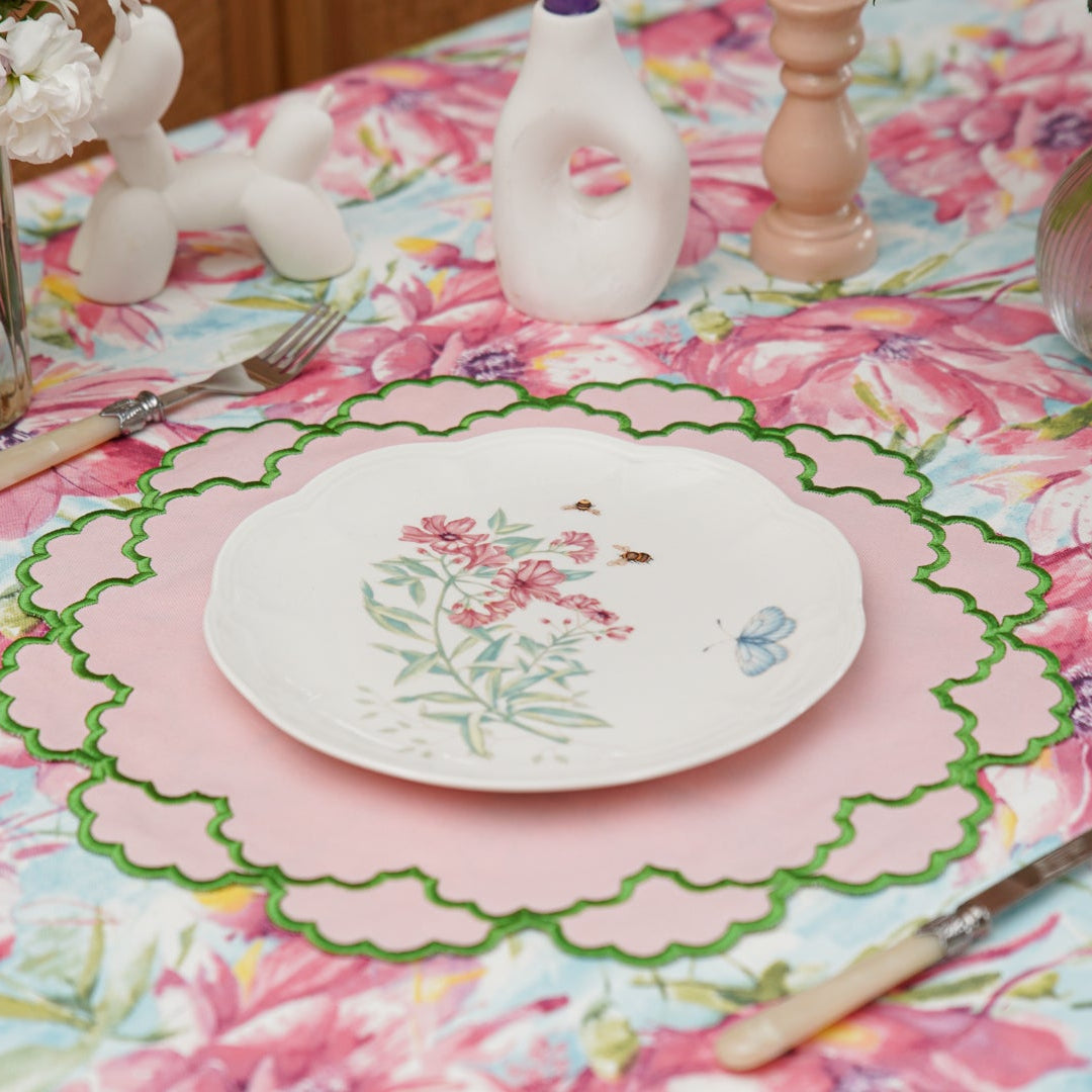 Table setting with floral tablecloth and plate