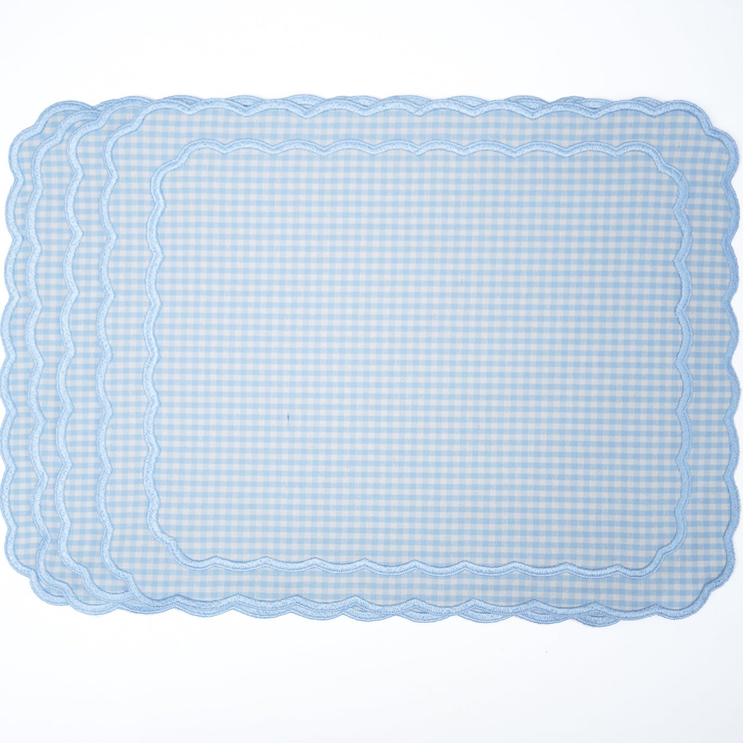 Rectangular blue checkered placemat on a white background