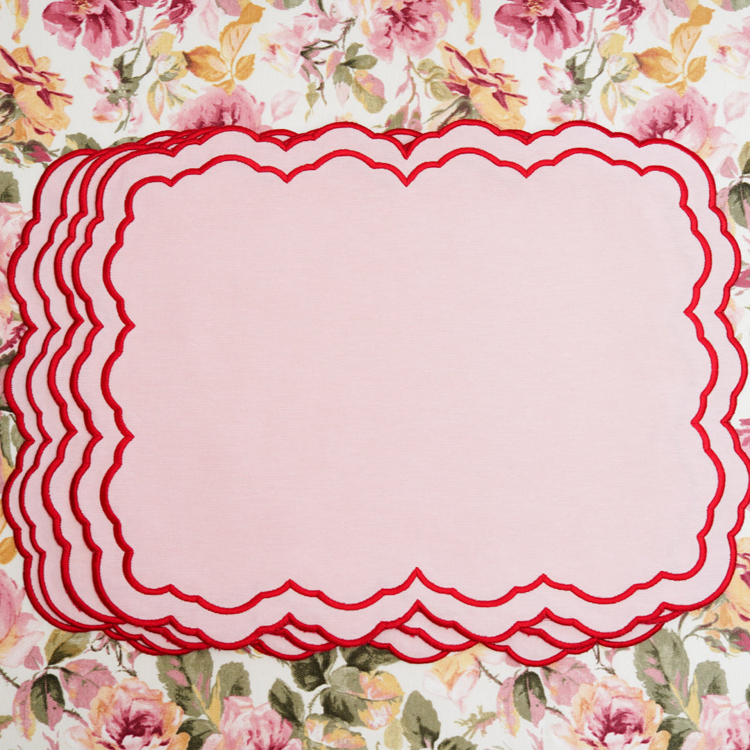 Decorative pink label with red border on a floral background