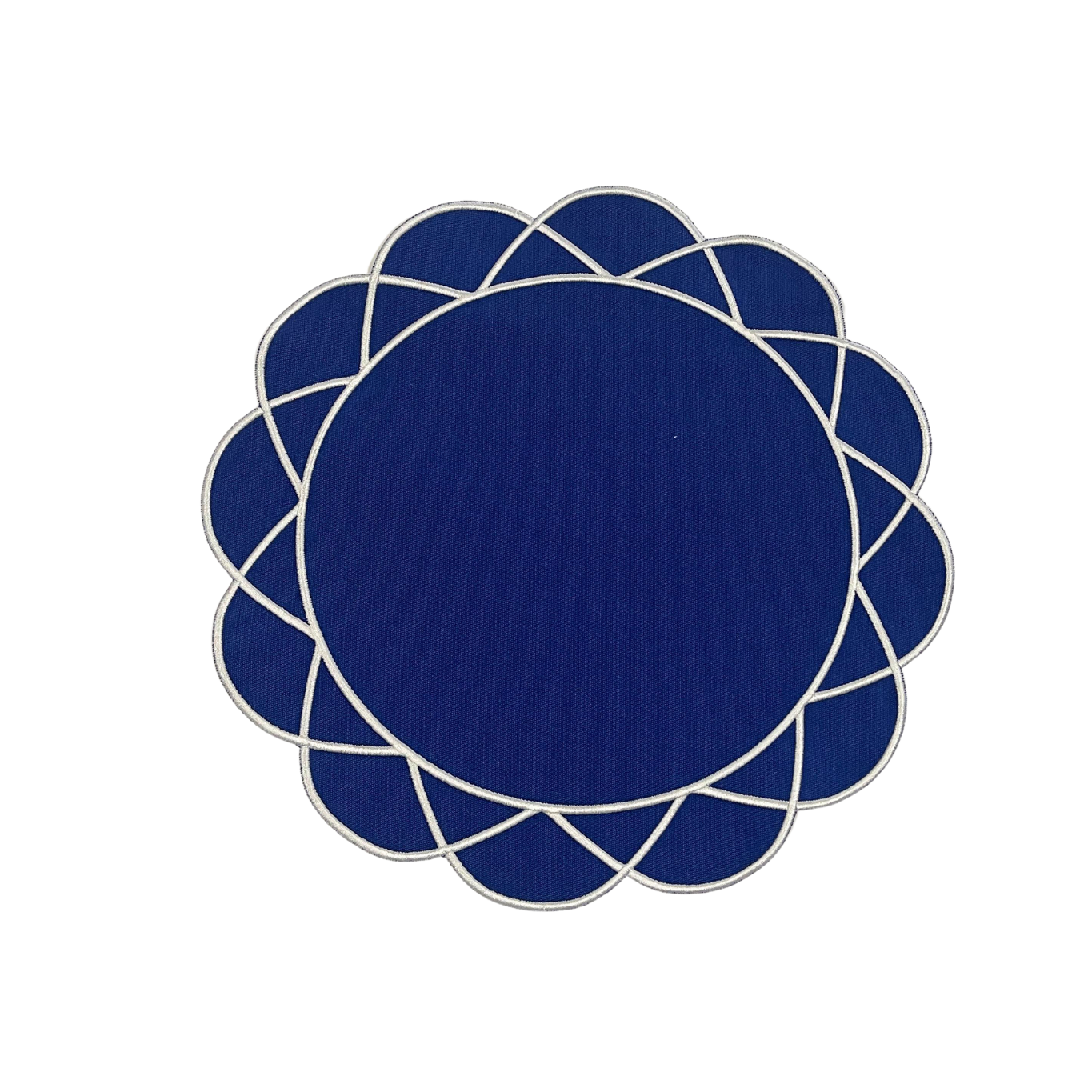 A navy blue fabric placemat with a floral pattern around the border.