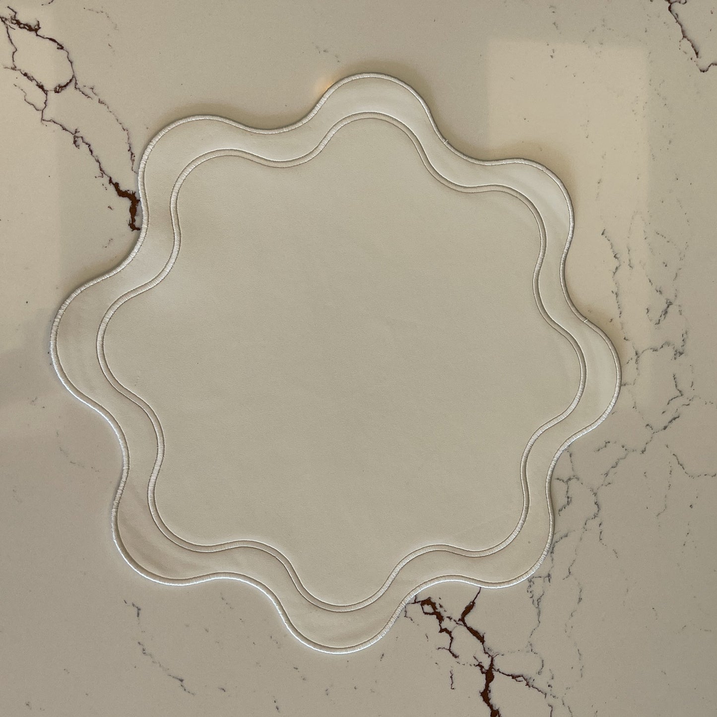 Decorative glass tray on a marble surface