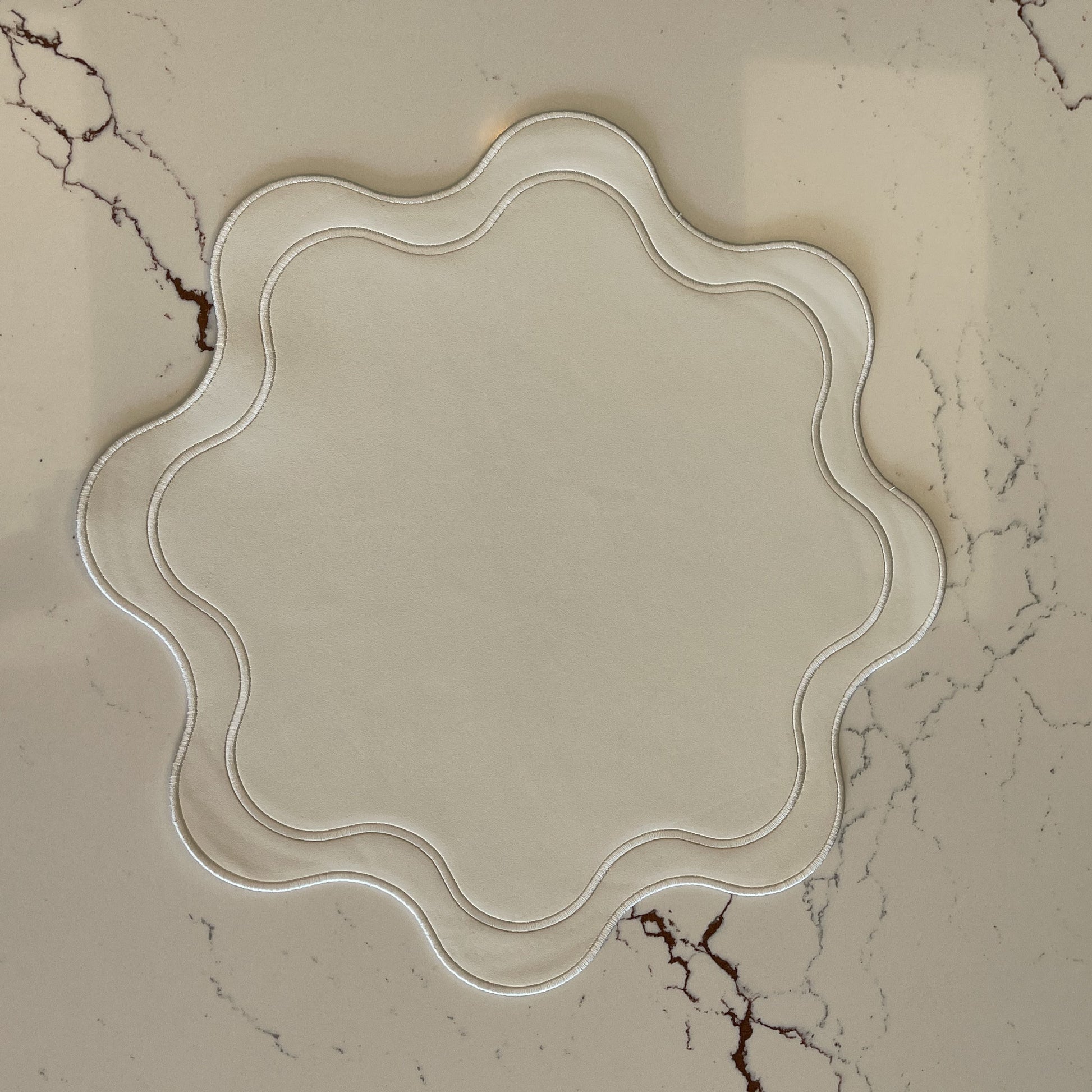 Decorative glass tray on a marble surface