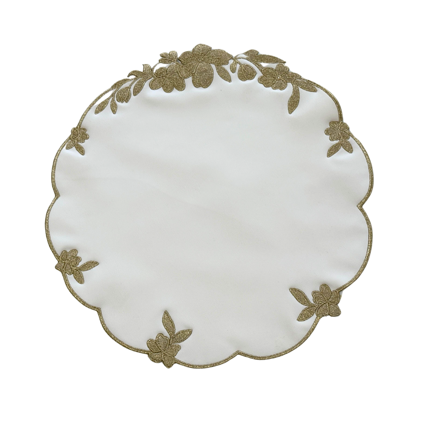 A round white faux leather placemat with gold floral embroidery around the edge.