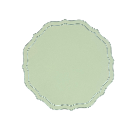 Round green faux leather placemat with a scalloped edge design and embroidered details around the perimeter.