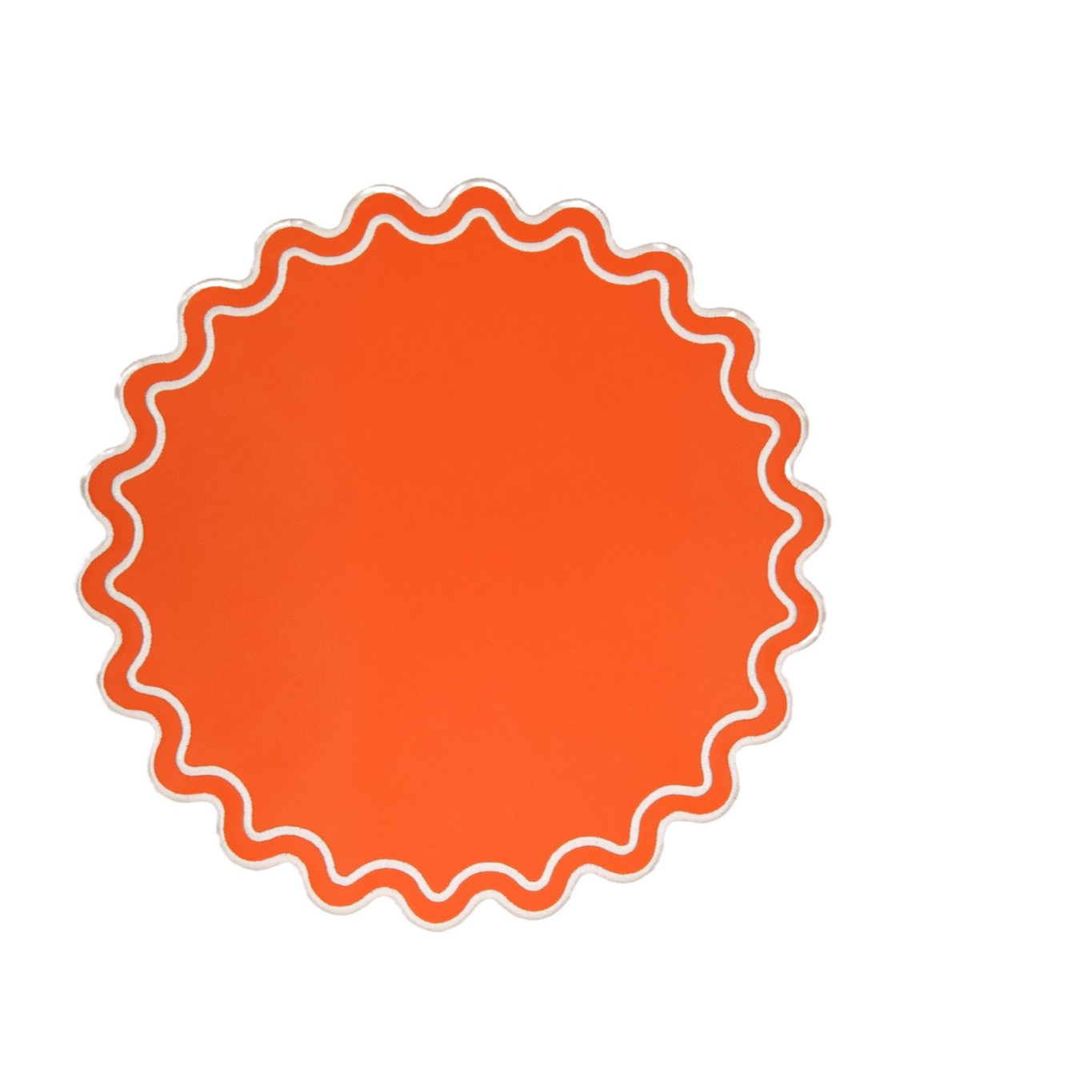 A single orange faux leather placemat with a scalloped edge design.