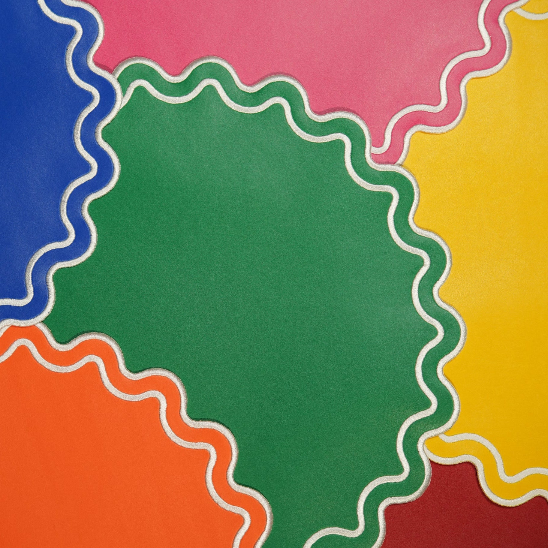 Colorful circular shapes with wavy edges on a multicolored background