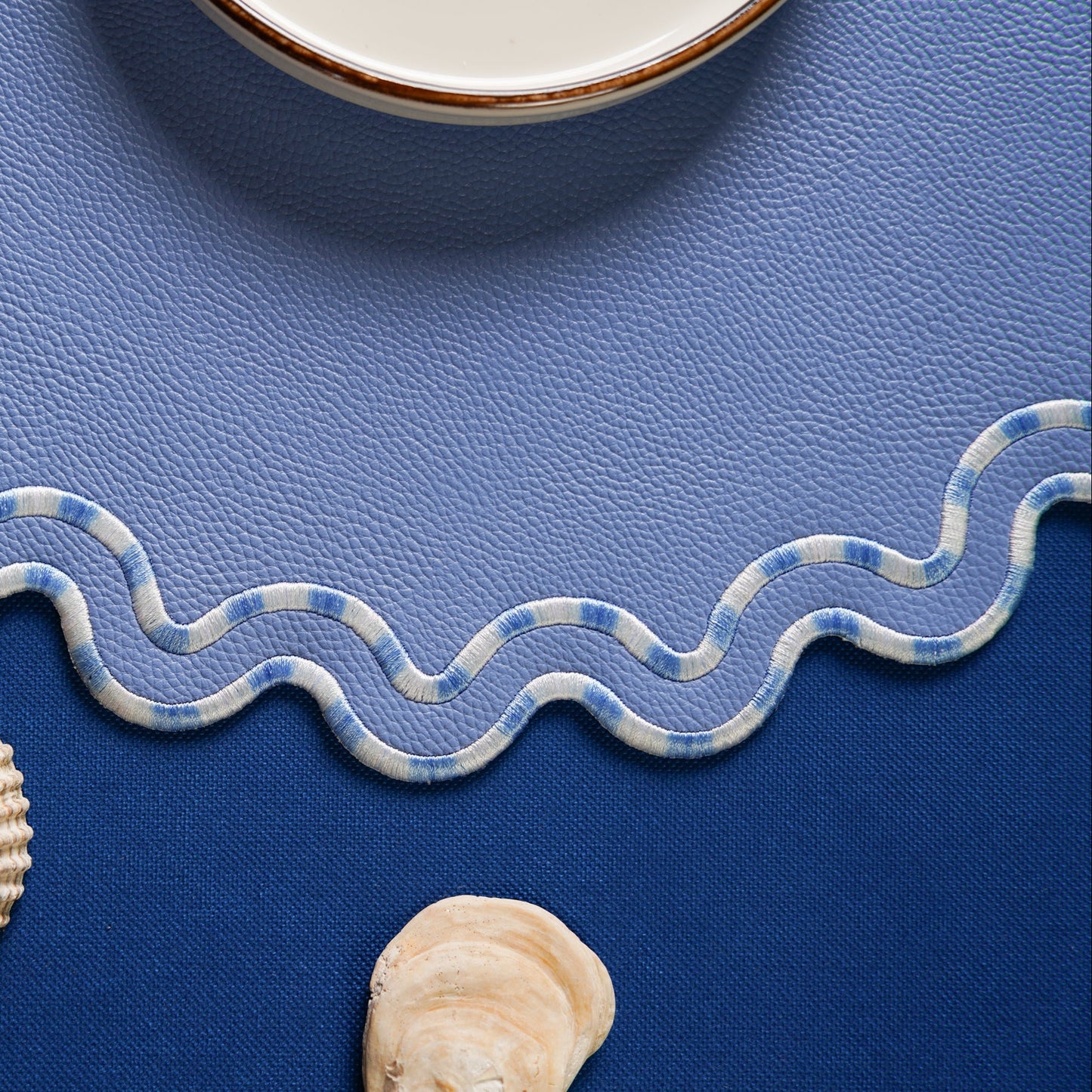 Decorative ribbon with wavy pattern on a blue background