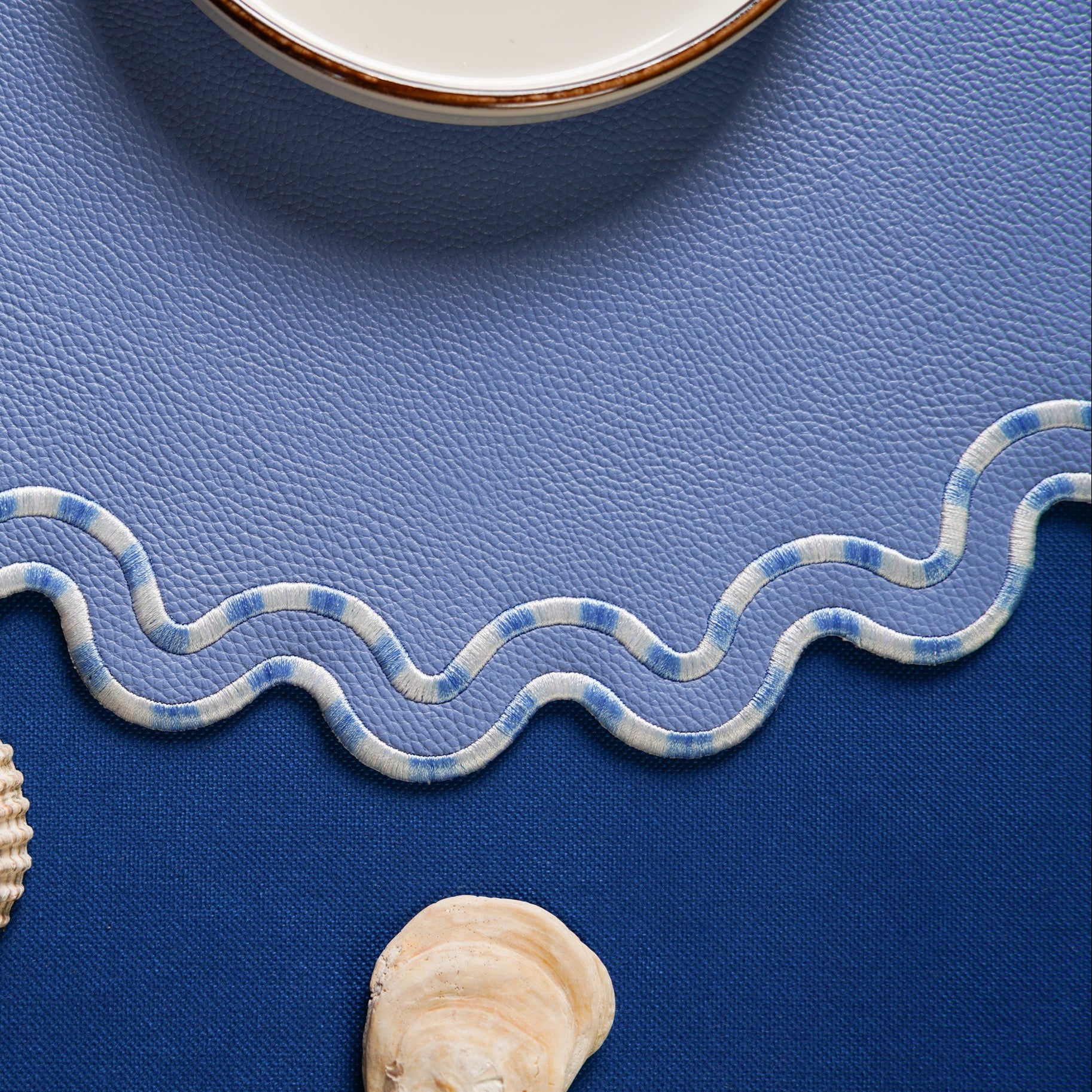 Decorative ribbon with wavy pattern on a blue background