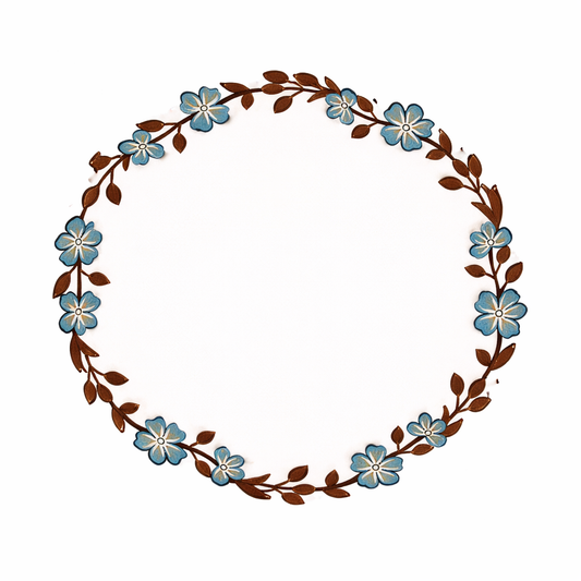 Decorative floral wreath with blue flowers and brown leaves on a white background