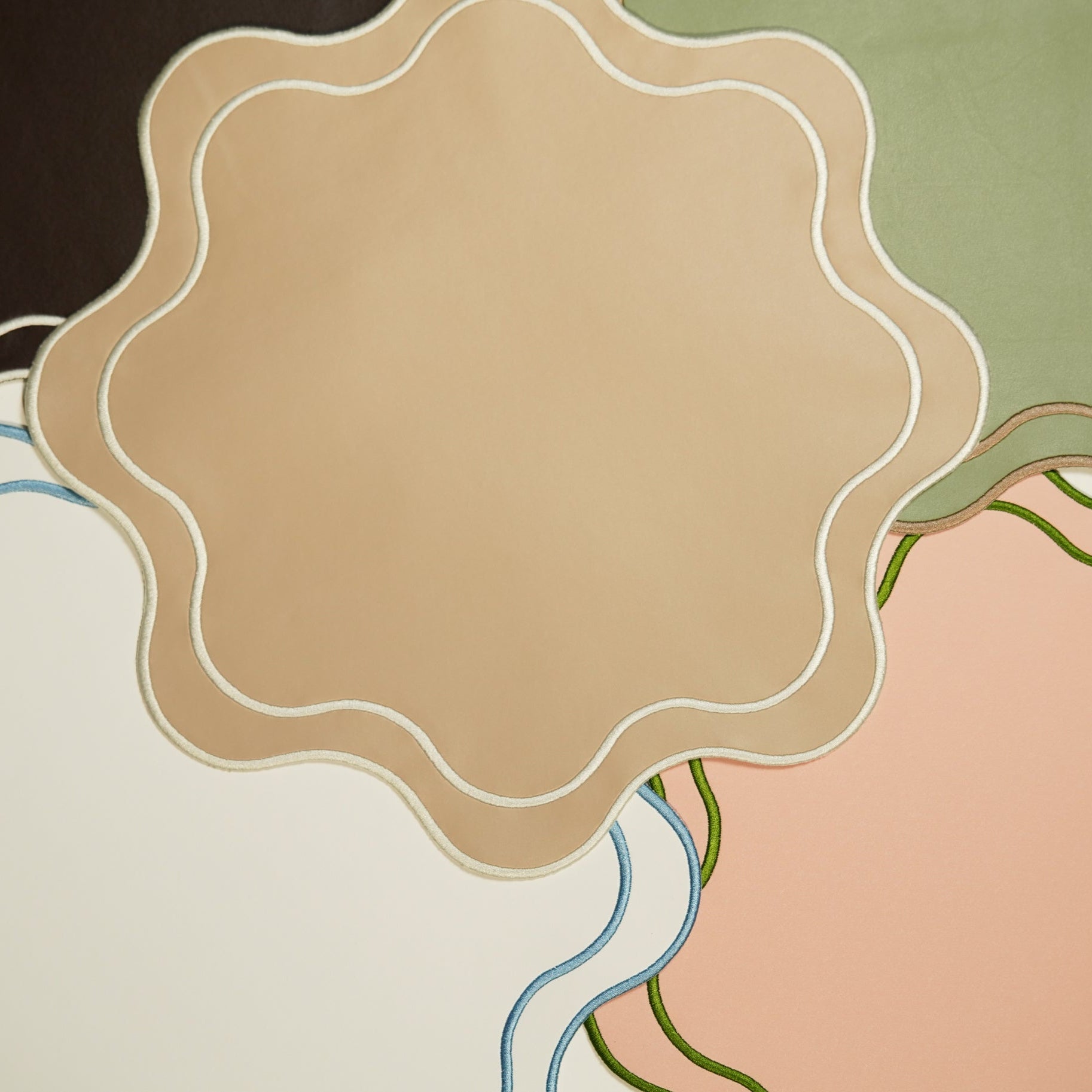 Abstract design with wavy lines and a central brown circle on a multicolored background