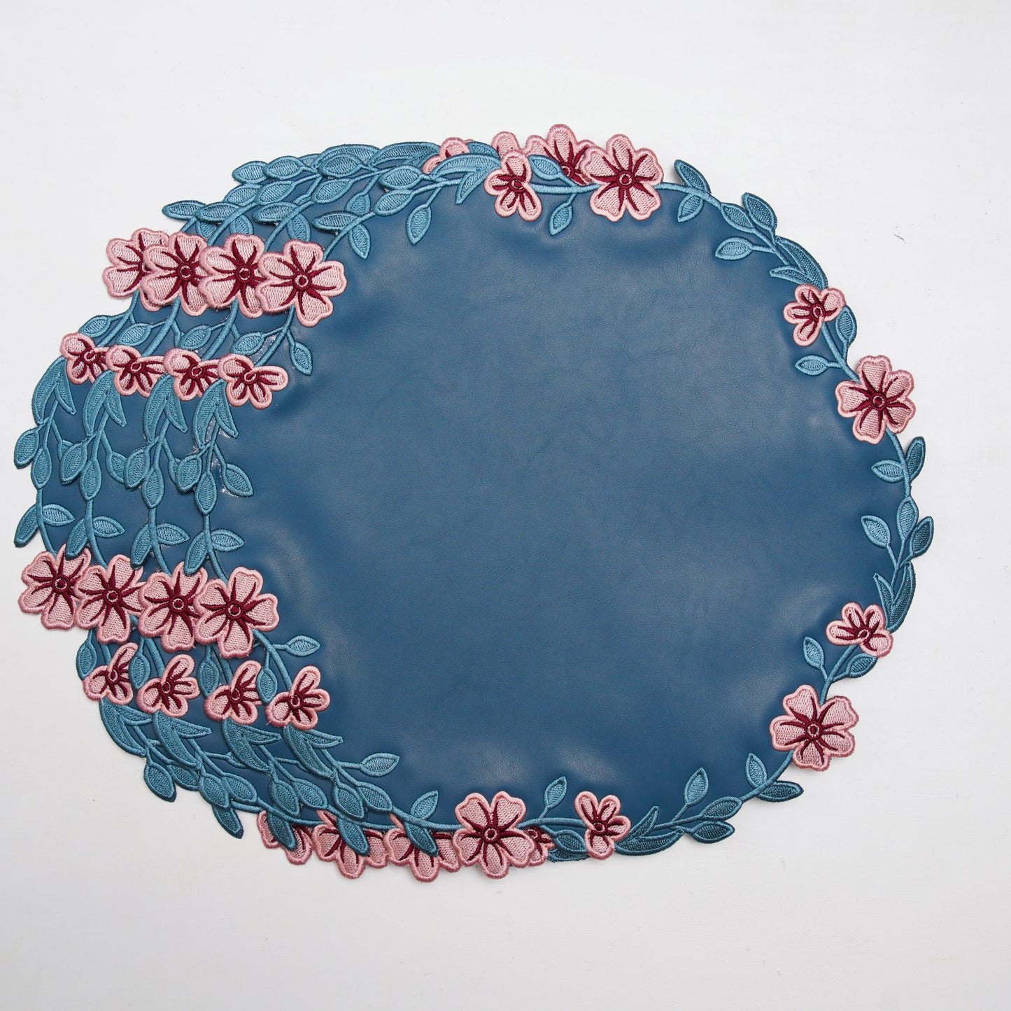 Decorative plate with floral design on a white background