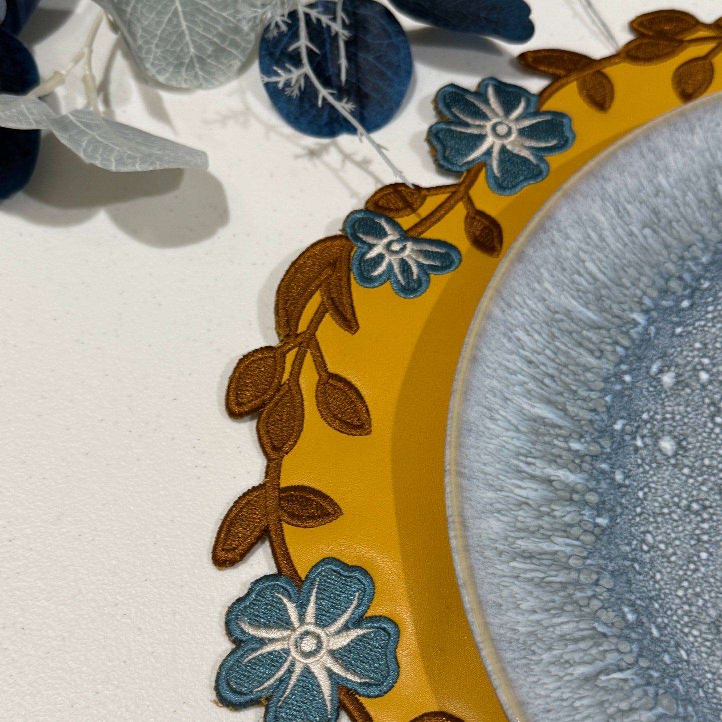 Decorative plate with floral design on a white background