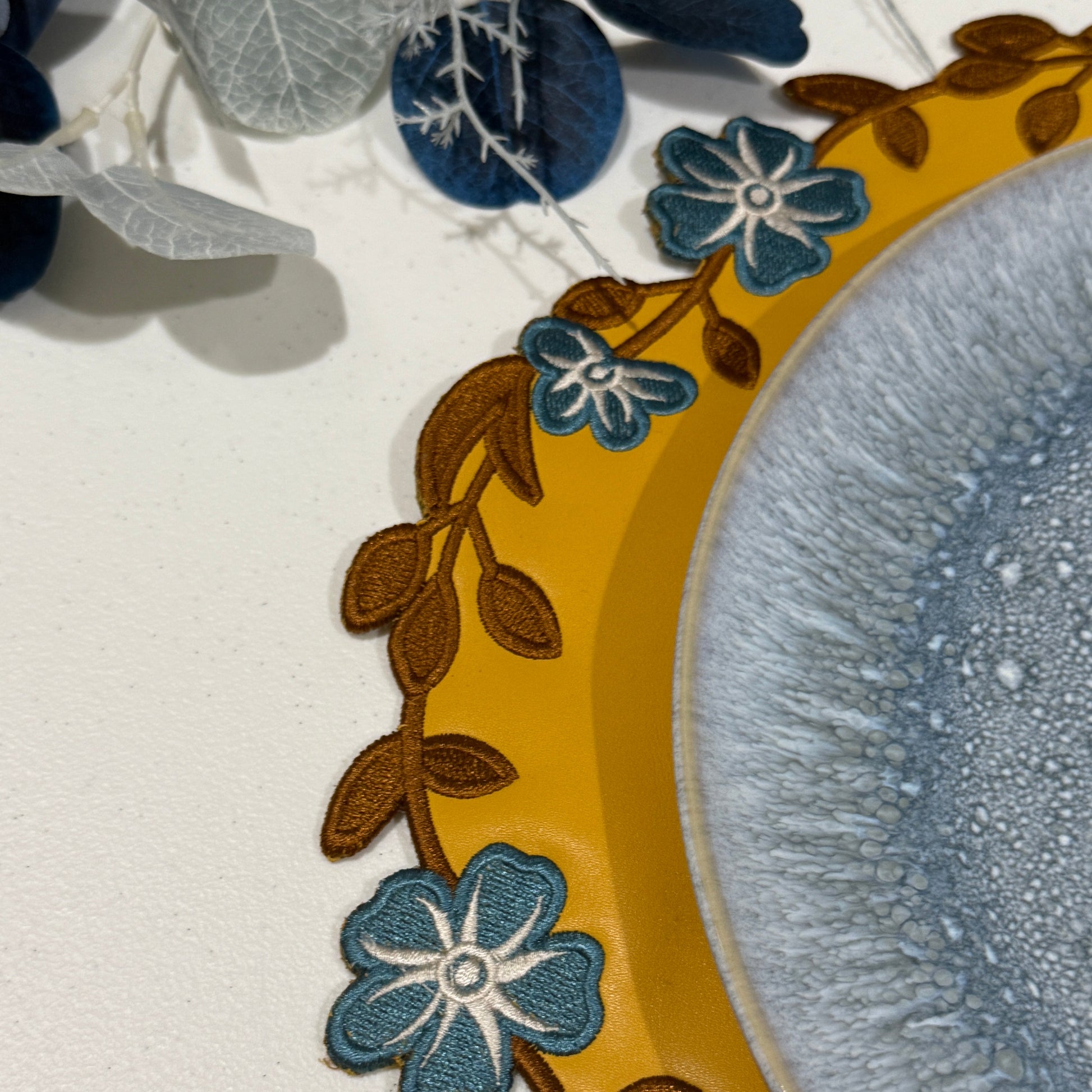 Decorative plate with floral design on a white background