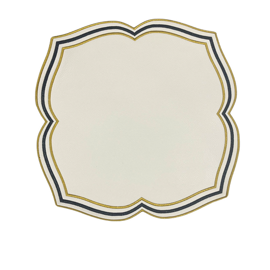 A rectangular faux leather placemat with a black and gold design, featuring a decorative border.